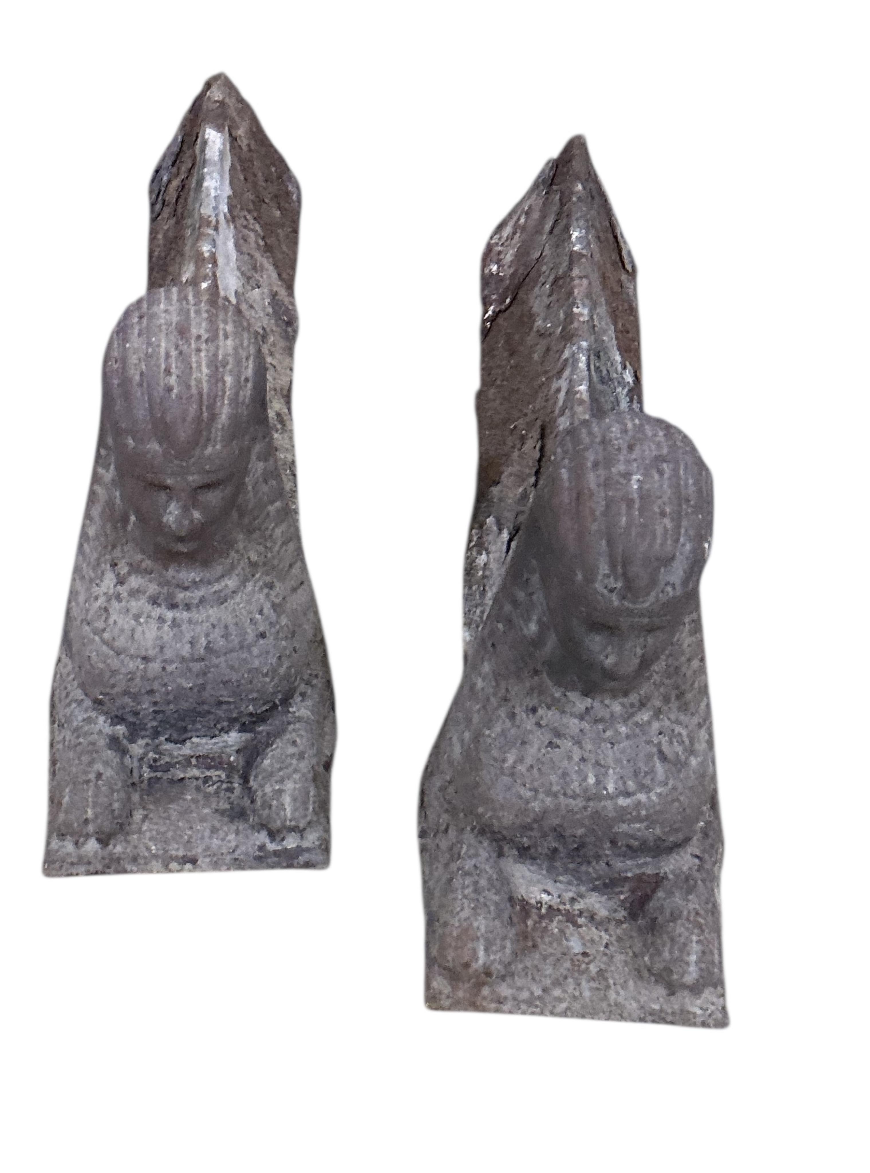 Three pairs of Victorian cast iron fire dogs and a fireback, damaged